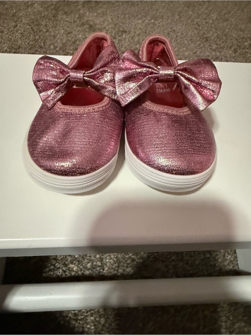 Stuart Weitzman Metallic Pink Bow Slip-On Sneakers for Kids